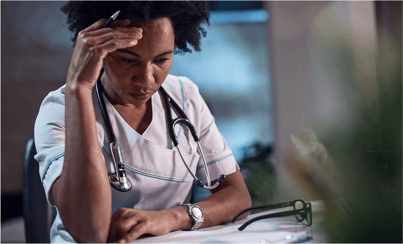 Healthcare worker reviewing documents